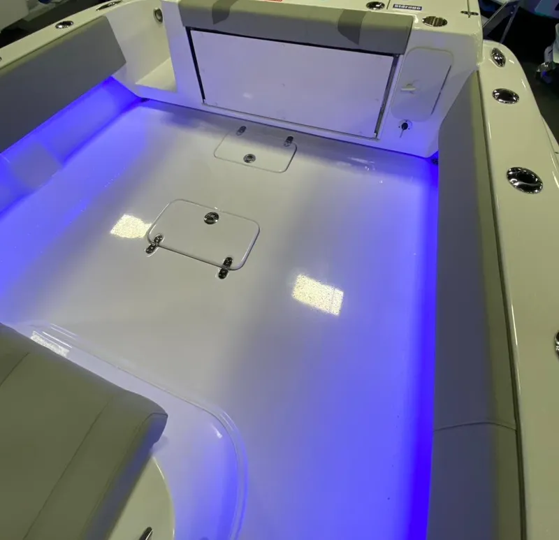 Slide: The Image of 2025 Cape Horn 34 XS boat interior with blue LED lighting. - 25