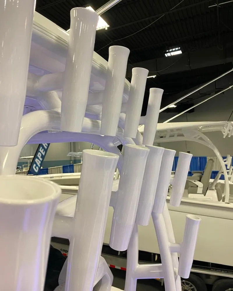 Slide: The Image of Cape Horn 34 XS 2025 boat rod holders at a marine exhibition. - 27