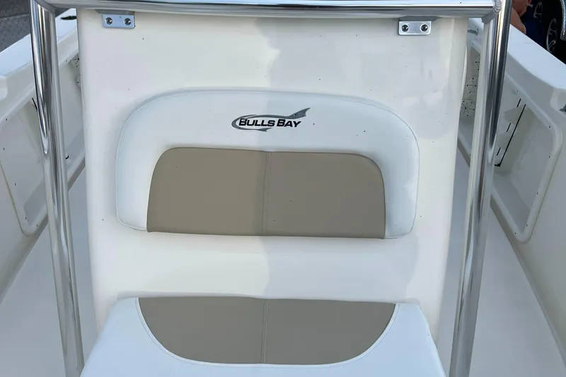 Slide: The Image of 2025 Bulls Bay 200 Center Console boat seat with logo detail. - 7