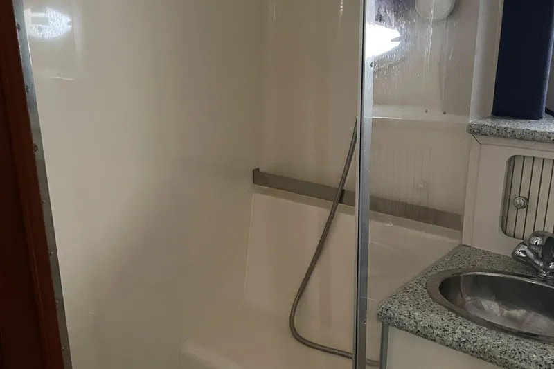 Slide: The Image of Bathroom interior of 2001 Carver 356 Aft Cabin Motor Yacht with shower and sink. - 11