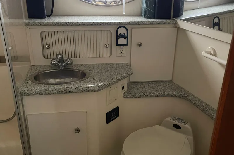 Slide: The Image of Bathroom interior of 2001 Carver 356 Aft Cabin Motor Yacht with sink and toilet. - 15