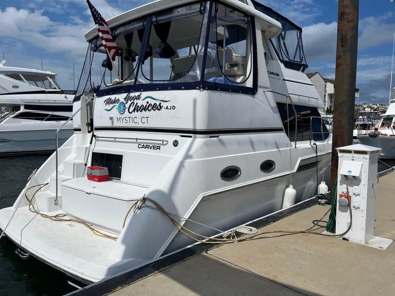 Slide: The Image of 2001 Carver 356 Aft Cabin Motor Yacht docked in Mystic, CT marina. - 2