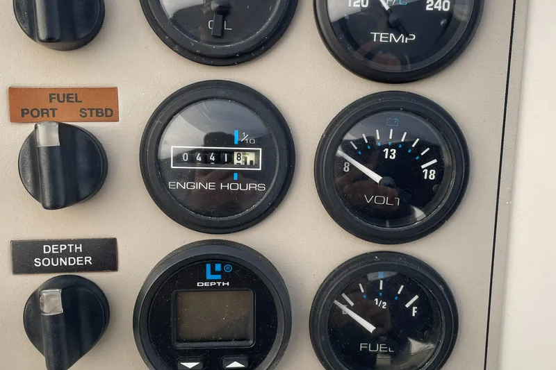Slide: The Image of Instrument panel of 2001 Carver 356 Aft Cabin Motor Yacht showing gauges and controls. - 22
