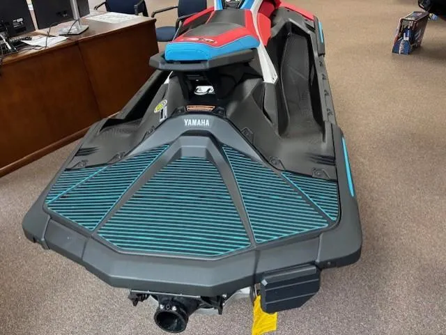 Slide: The Image of 2025 Yamaha WaveRunner JetBlaster DLX 3-Up, sleek design, vibrant colors, showroom display. - 3