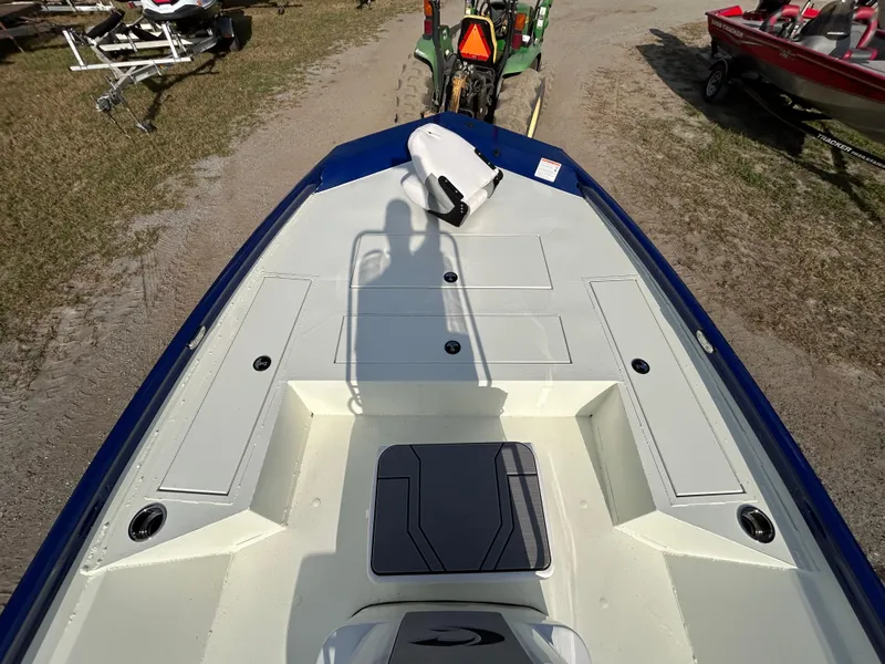 Slide: The Image of 2025 Crestliner 2000 Bay boat deck, featuring spacious seating and storage areas. - 12