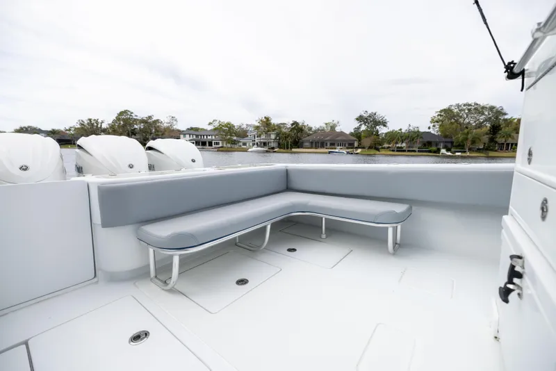 Slide: The Image of 2022 Contender 35ST boat with spacious seating area and sleek design. - 48