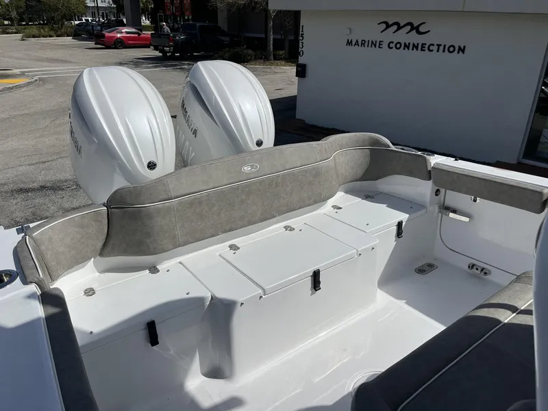 Slide: The Image of 2025 Sea Hunt Ultra 265 SE boat with dual engines at Marine Connection. - 31