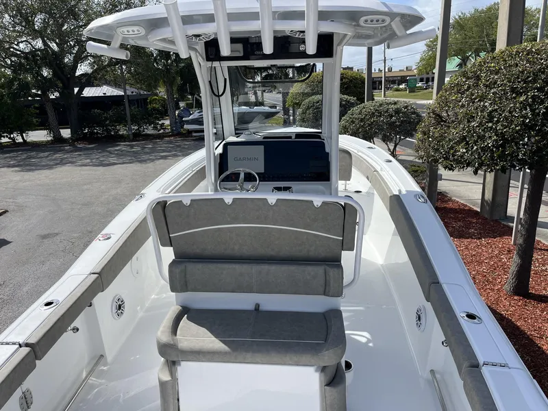Slide: The Image of 2025 Sea Hunt Ultra 265 SE boat interior with Garmin navigation system. - 10