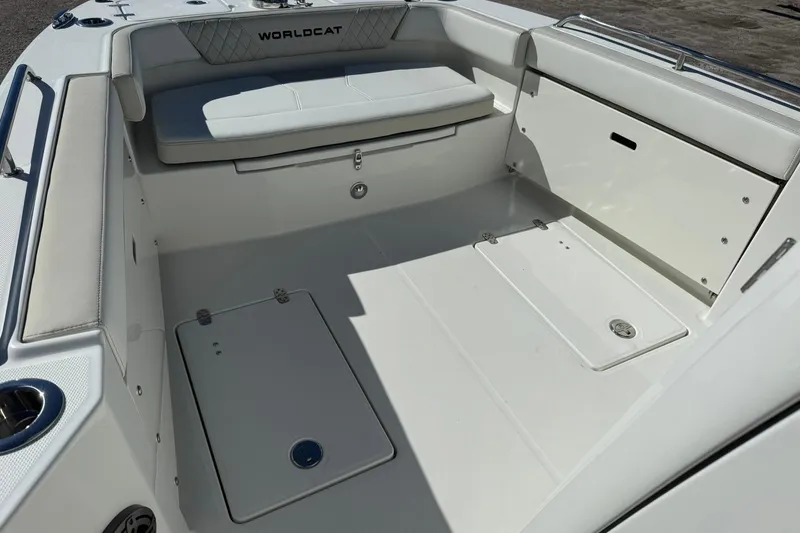 Slide: The Image of 2026 World Cat 235 TE boat interior with seating and storage compartments. - 36