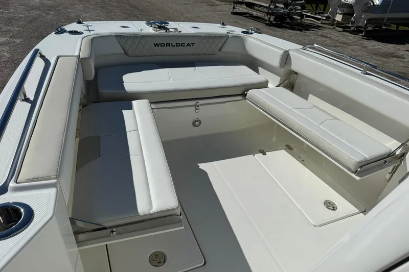 Slide: The Image of 2026 World Cat 235 TE boat interior with white seating and spacious layout. - 38
