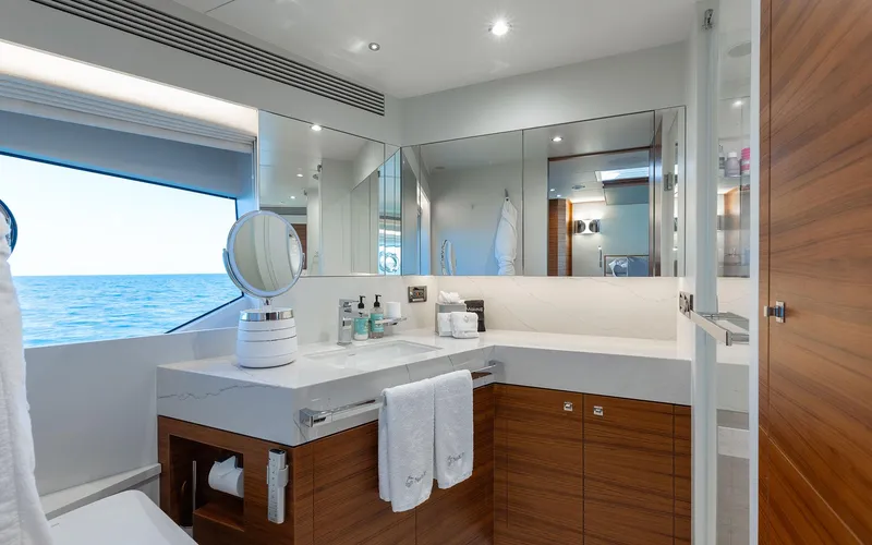 Slide: The Image of Luxurious bathroom on 2022 Horizon FD 92 yacht with ocean view and modern amenities. - 10