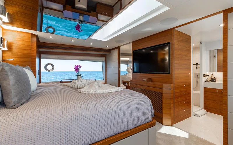 Slide: The Image of Luxurious bedroom interior of 2022 Horizon FD 92 yacht with ocean view. - 7
