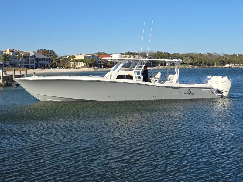 Slide: The Image of 2024 Invincible 43 Open Fisherman boat on calm water, side view. - 28