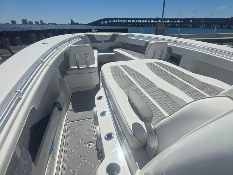 Slide: The Image of 2024 Invincible 43 Open Fisherman boat interior with luxurious seating and ocean view. - 3