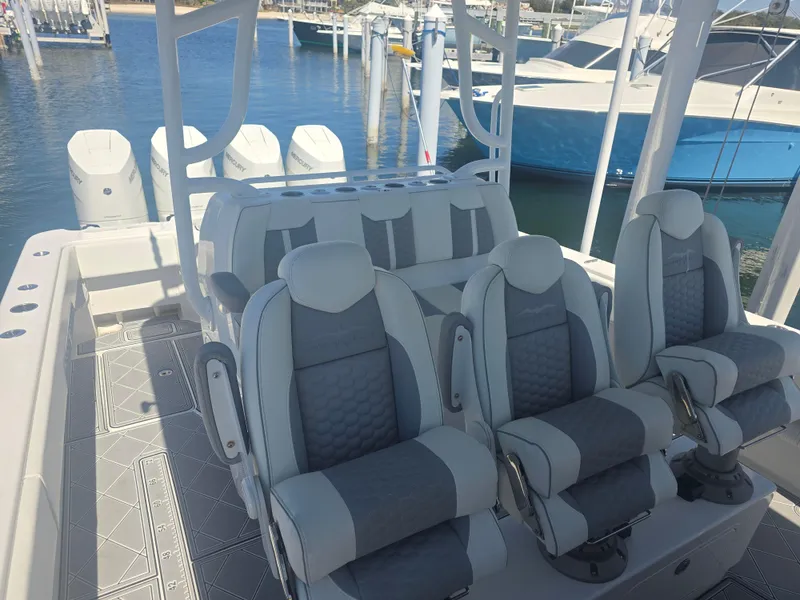 Slide: The Image of 2024 Invincible 43 Open Fisherman boat interior with luxurious seating and modern design. - 8