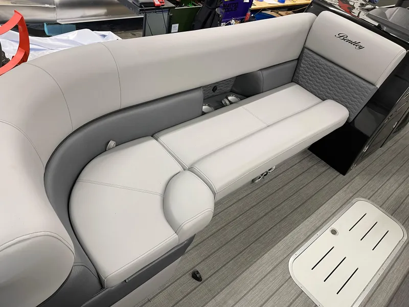 Slide: The Image of 2025 Bentley Pontoons Elite 253 Swingback Tower interior with luxurious seating. - 10
