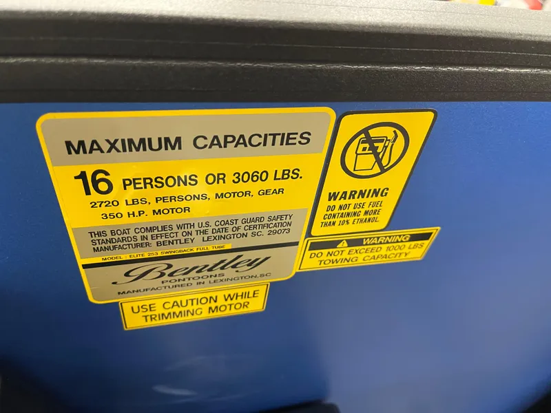 Slide: The Image of 2025 Bentley Pontoons Elite 253 Swingback Tower capacity warning label, 16 persons or 3060 lbs. - 14
