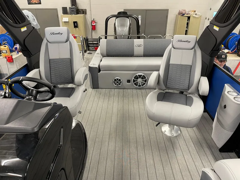 Slide: The Image of 2025 Bentley Pontoons Elite 253 Swingback Tower interior with luxurious seating and modern design. - 8