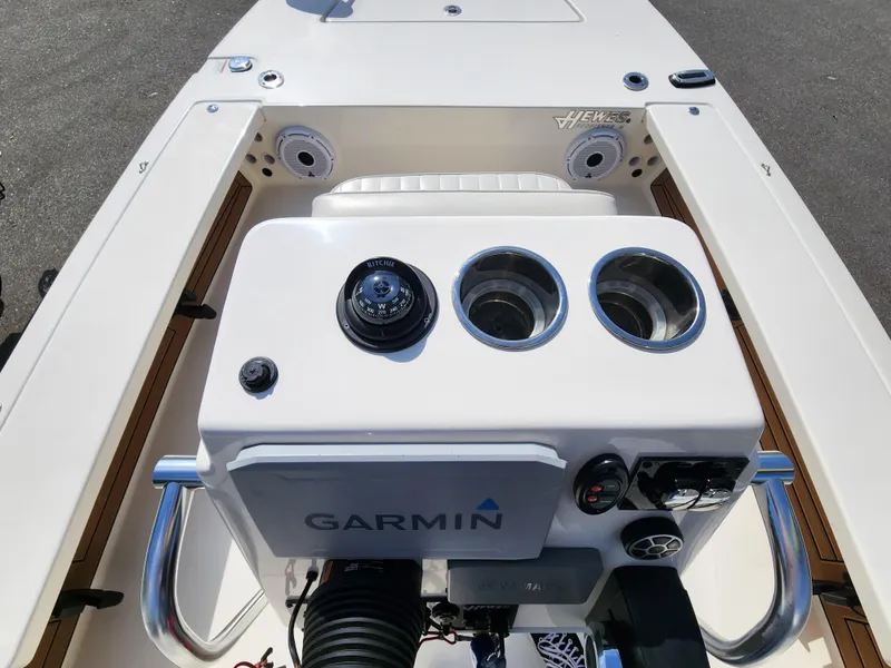 Slide: The Image of 2020 Hewes Redfisher 18 boat console with Garmin navigation system and compass. - 9