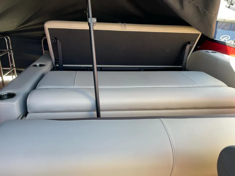 Slide: The Image of 2025 Bentley Pontoons Legacy 200 Swingback interior seating with adjustable backrest. - 8