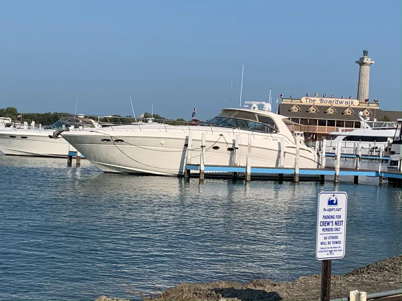 Slide: The Image of Sea Ray 510 Sundancer 2000 yacht docked near The Boardwalk, sunny day. - 0