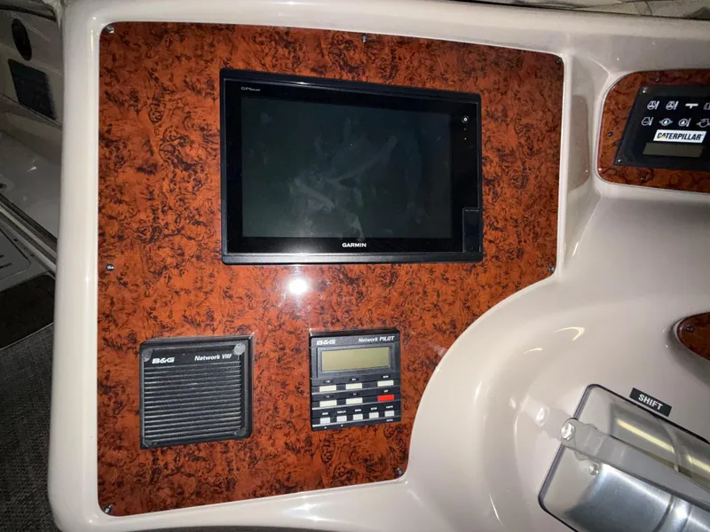 Slide: The Image of Control panel of a 2000 Sea Ray 510 Sundancer with Garmin and B&G equipment. - 18