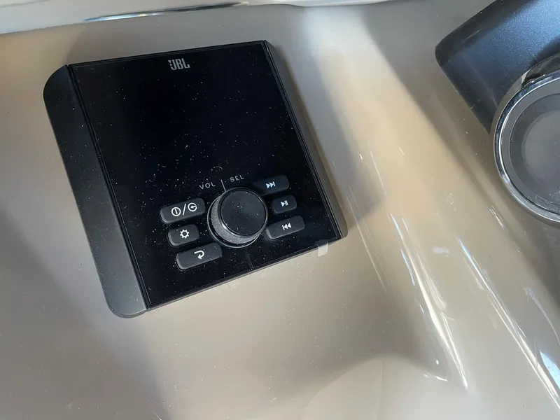 Slide: The Image of JBL audio control panel in 2025 Bentley Pontoons LE 200 CW. - 12