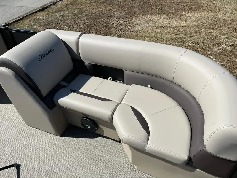 Slide: The Image of 2025 Bentley Pontoons LE 200 CW, luxurious seating with beige and gray upholstery. - 8