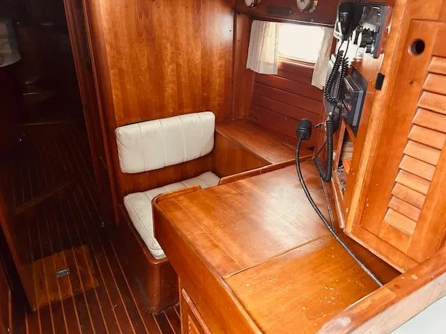 Slide: The Image of Interior of 1990 Bristol 47.7 yacht with wooden finish and navigation equipment. - 15