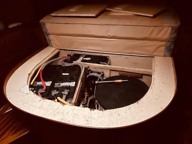 Slide: The Image of Battery compartment of a 1990 Bristol 47.7 boat, showing wiring and components. - 20