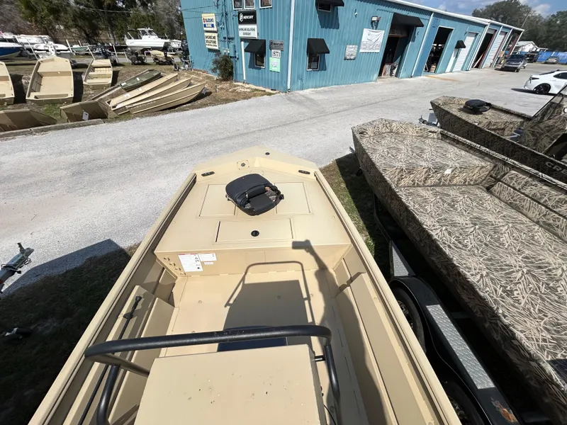Slide: The Image of 2024 Crestliner 1860 Retriever CC Tunnel boat at dealership, top view. - 11