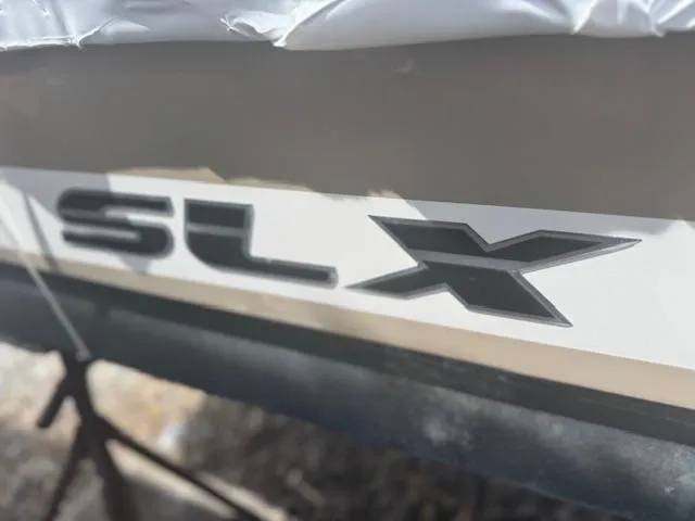 Slide: The Image of Close-up of 2015 Sea Ray 270 SLX boat logo on hull. - 21