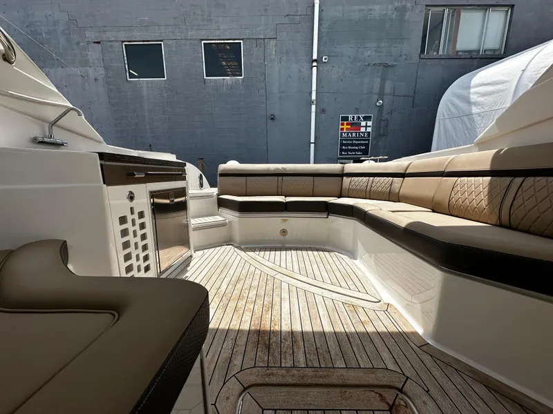Slide: The Image of 2018 Sea Ray SLX 350 boat interior with spacious seating and elegant design. - 2