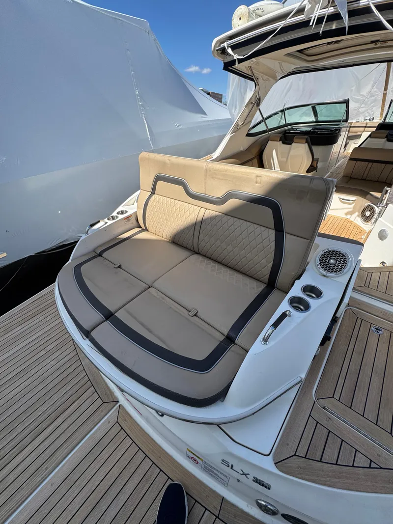 Slide: The Image of 2018 Sea Ray SLX 350 luxury boat with spacious seating and sleek design. - 24