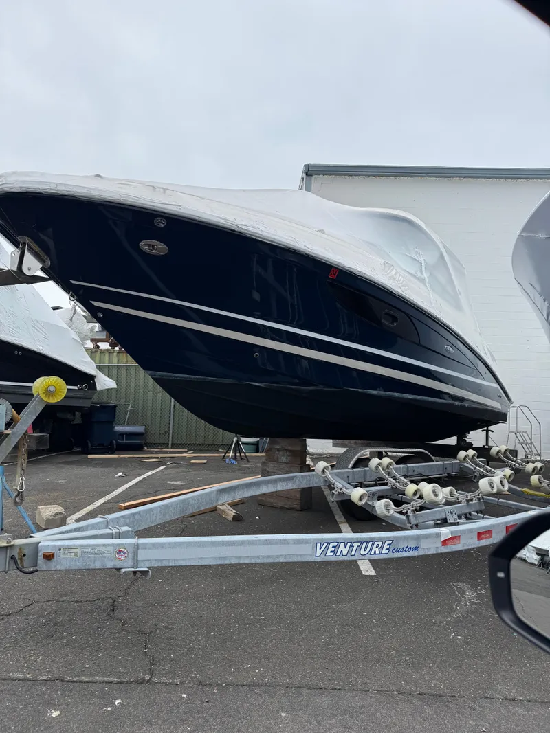 Slide: The Image of 2018 Sea Ray SLX 350 boat on trailer, parked outdoors. - 3