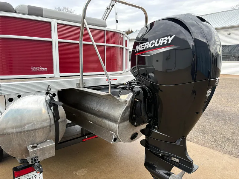 Slide: The Image of 2020 Bennington 22 SLX pontoon boat with Mercury outboard motor, red paneling. - 10