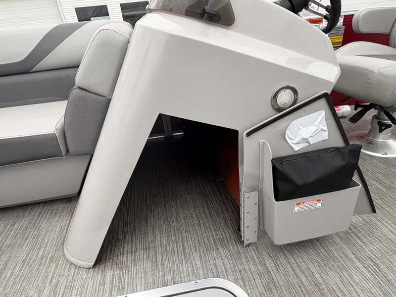 Slide: The Image of 2020 Bennington 22 SLX boat interior with seating and storage compartments. - 20