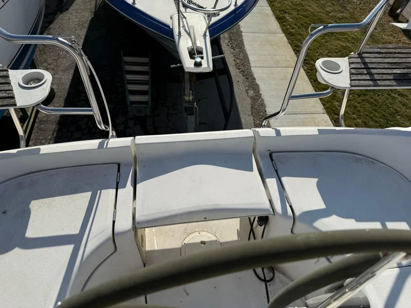 Slide: The Image of Hunter 33 sailboat cockpit view, 2007 model, featuring seating and steering wheel. - 28