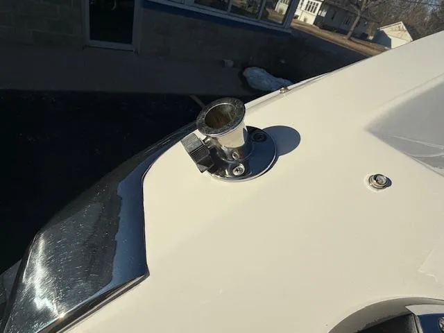 Slide: The Image of 2016 Regal 2800 Bowrider boat detail showing a metal fitting on the deck. - 42