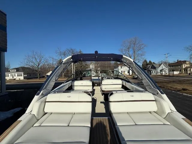 Slide: The Image of 2016 Regal 2800 Bowrider boat with spacious seating and sleek design. - 5