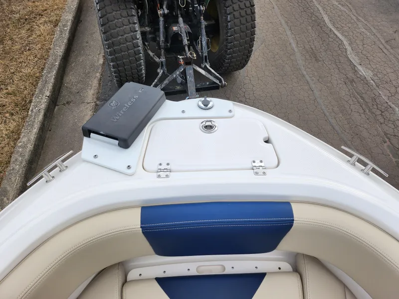 Slide: The Image of 2017 Chaparral 21 H2O Ski & Fish OB boat, front view, on trailer. - 21