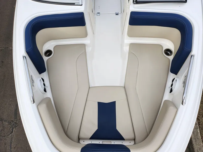 Slide: The Image of 2017 Chaparral 21 H2O Ski & Fish OB boat interior with blue and beige seating. - 23