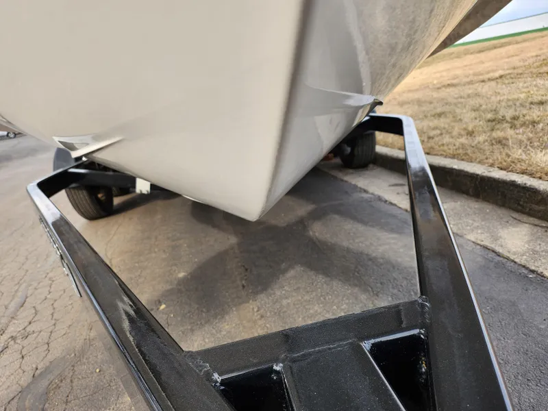 Slide: The Image of 2017 Chaparral 21 H2O Ski & Fish OB boat on trailer, close-up view. - 7