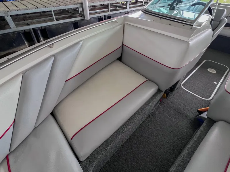 Slide: The Image of Interior seating of a 1993 Chaparral 2200 SL boat with white and red upholstery. - 30