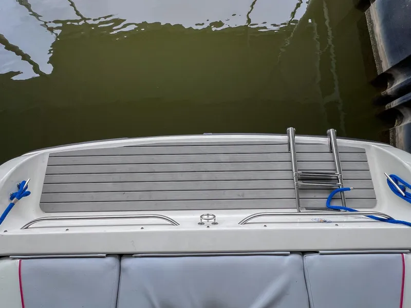 Slide: The Image of Chaparral 2200 SL 1993 boat stern with swim platform and ladder. - 5