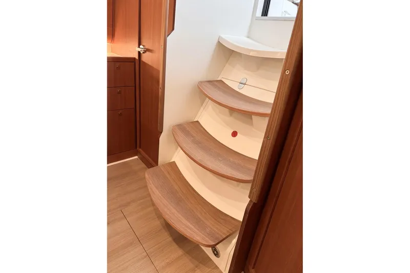 Slide: The Image of Interior wooden stairs on 2026 J Boats J/36 yacht, featuring sleek design and craftsmanship. - 15