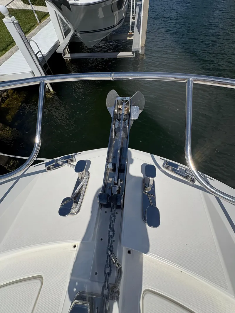 Slide: The Image of Bow of 2018 Prestige 680 yacht with anchor chain and railing. - 32