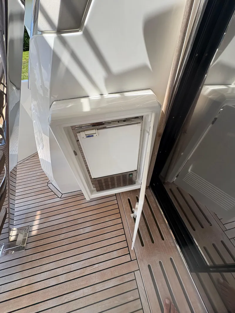 Slide: The Image of Luxury yacht Prestige 680, 2018 model, featuring sleek deck design and modern amenities. - 36