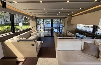 Slide: The Image of Luxurious interior of 2018 Prestige 680 yacht with elegant seating and large windows. - 4