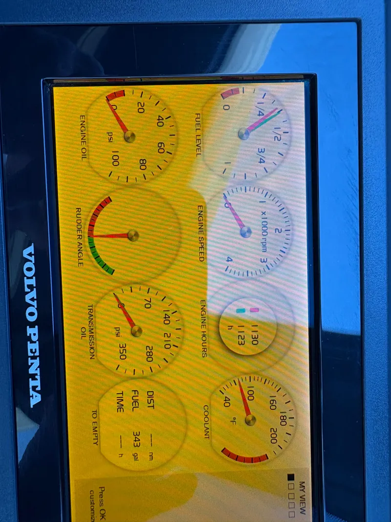 Slide: The Image of Volvo Penta engine display on a 2018 Prestige 680 yacht, showing various gauges and indicators. - 48